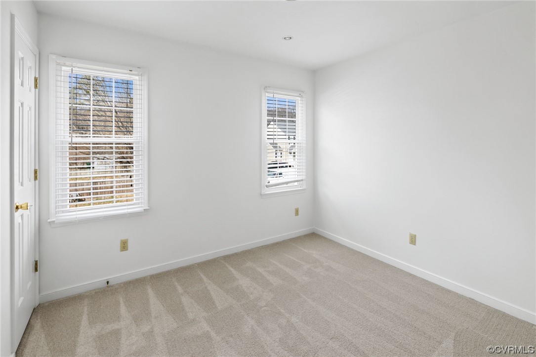 13605 Danwoods Road Midlothian, VA 23113 - Photo 14 of 20 a view of an empty room with a window