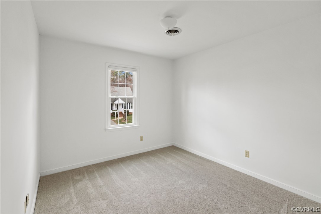 13605 Danwoods Road Midlothian, VA 23113 - Photo 15 of 20 an empty room with a window