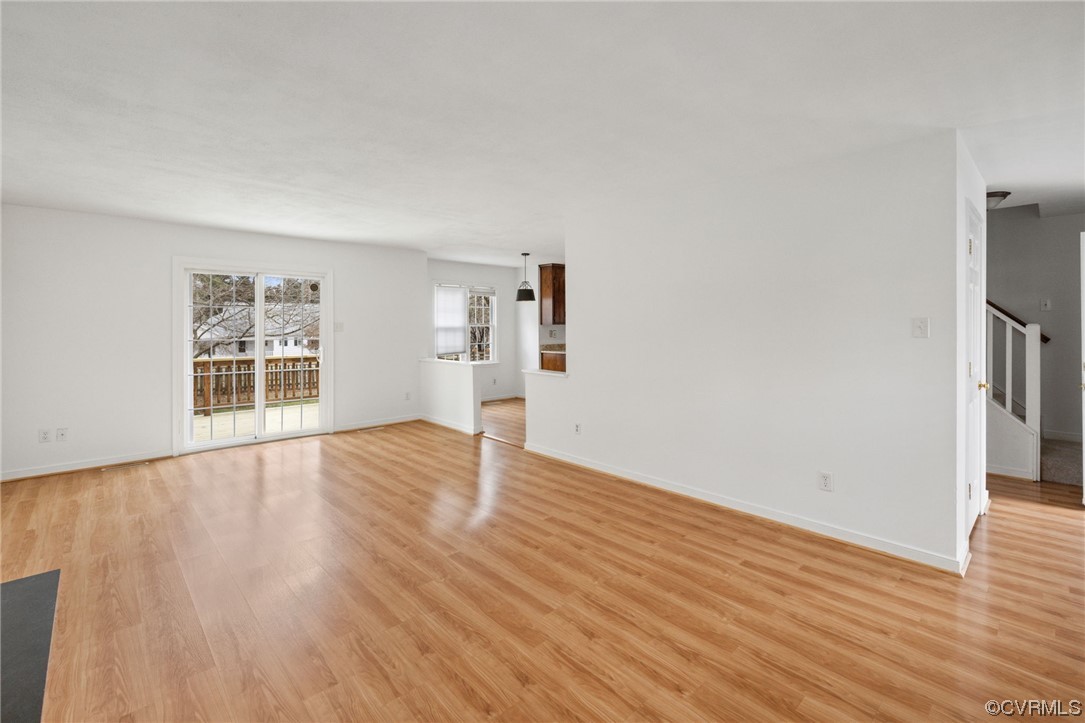 13605 Danwoods Road Midlothian, VA 23113 - Photo 3 of 20 wooden floor in an empty room with a window