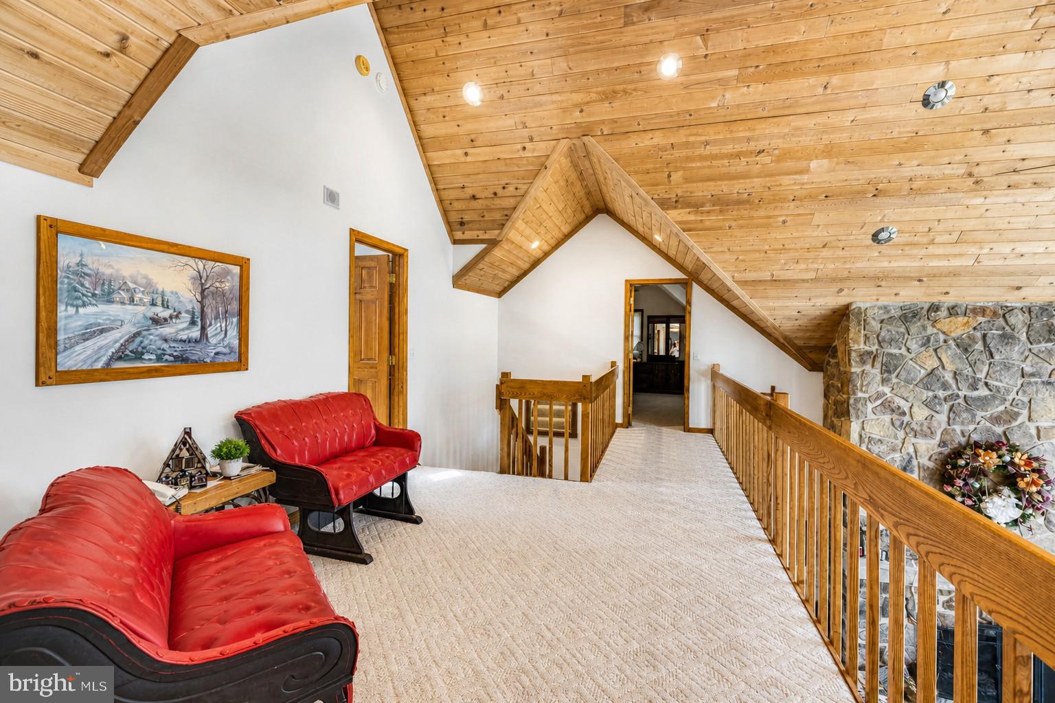 389 Sawmill Hollow Road Swanton, MD 21561 - Photo 27 of 62 a balcony with furniture and wooden floor