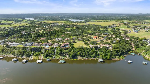 a view of a lake with a houses