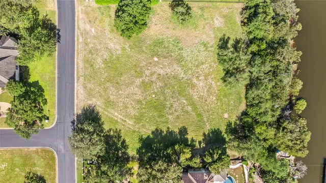 a view of a swimming pool from a balcony