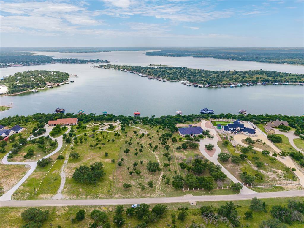 977 Deep Water Road May, TX 76857 - Photo 1 of 36 a view of a lake with a lake