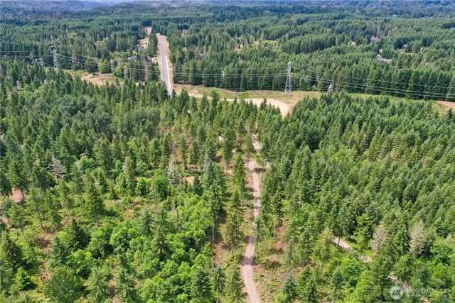 a view of a lake with a yard