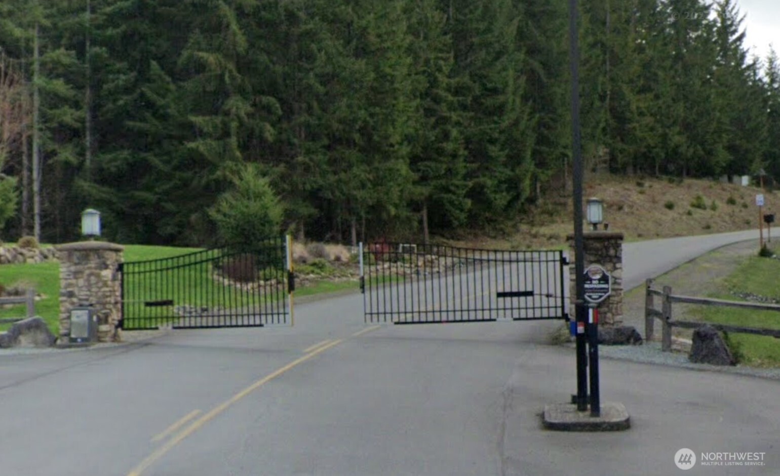 0 A P Tubbs Road Buckley, WA 98321 - Photo 6 of 27 a view of a park with iron fence