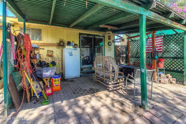 a view of a storage room with wooden floor