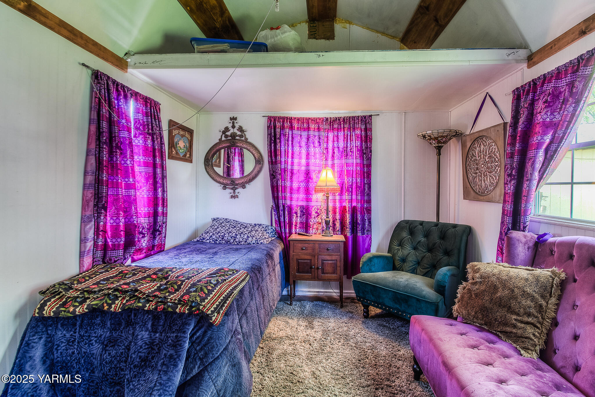 10608 Hackett Road Yakima, WA 98903 - Photo 25 of 40 a bedroom with a bed and a couch