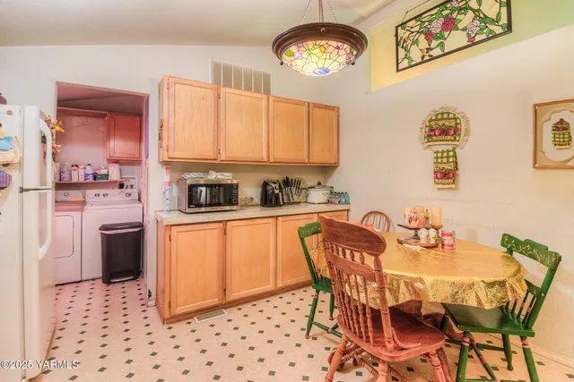 a view of a dining room with furniture