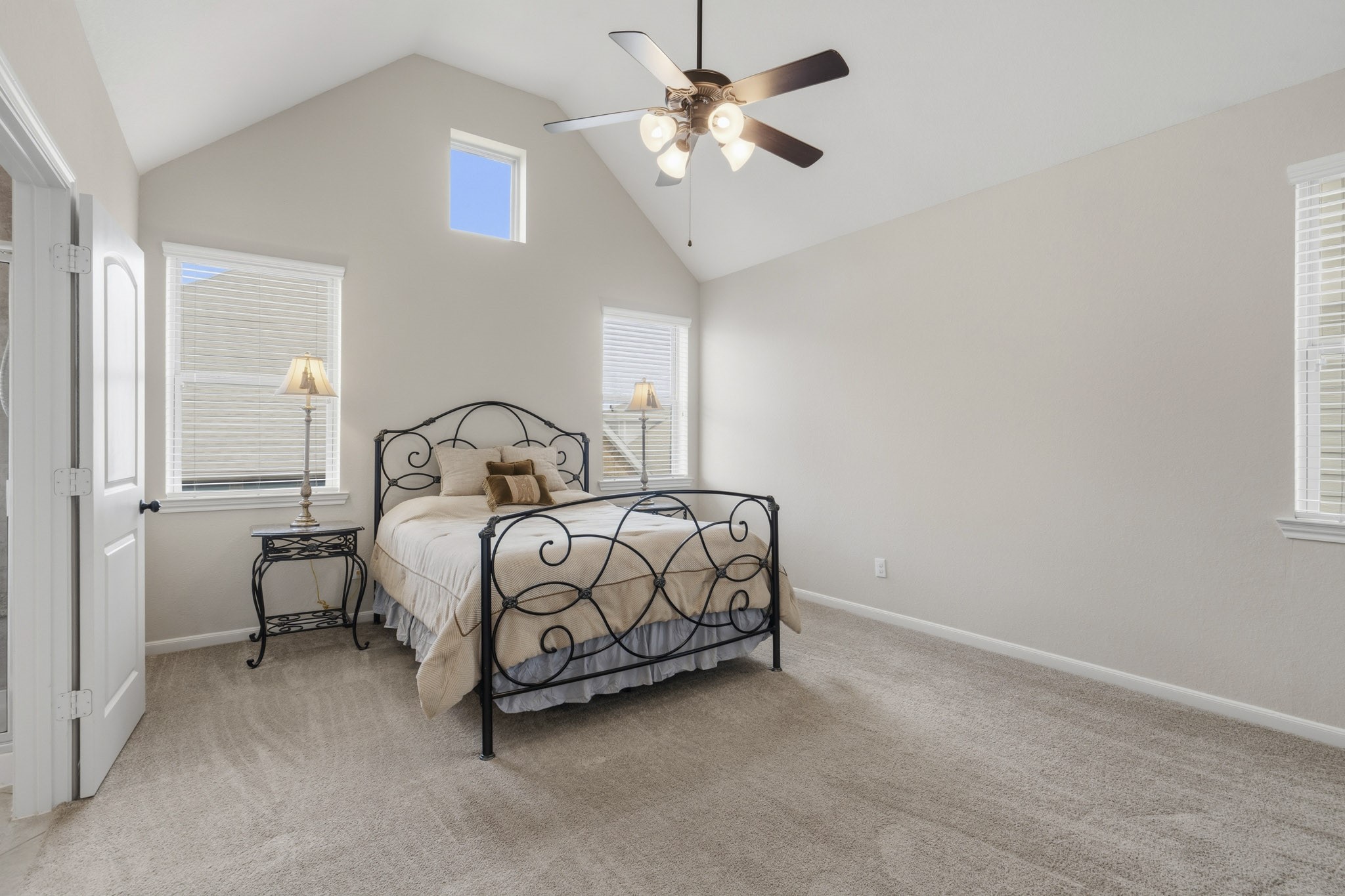 12115 San Luca Street Richmond, TX 77406 - Photo 23 of 44 Retreat to the private primary suite. This spacious sanctuary offers plush carpeting, abundant natural light, and a peaceful setting at the end of the day.