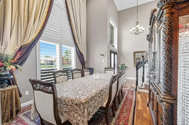 a view of hall way with furniture