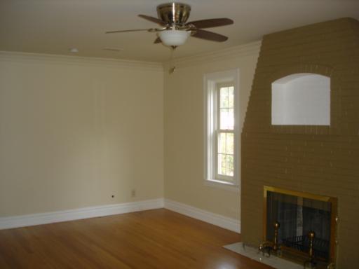 292 Blackhawk Road Riverside, IL 60546 - Photo 2 of 13 an empty room with windows and fan