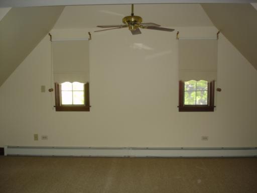 292 Blackhawk Road Riverside, IL 60546 - Photo 7 of 13 an empty room with a window