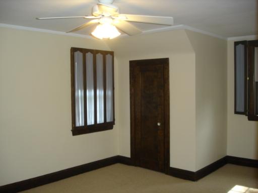 292 Blackhawk Road Riverside, IL 60546 - Photo 8 of 13 an empty room with windows and fan
