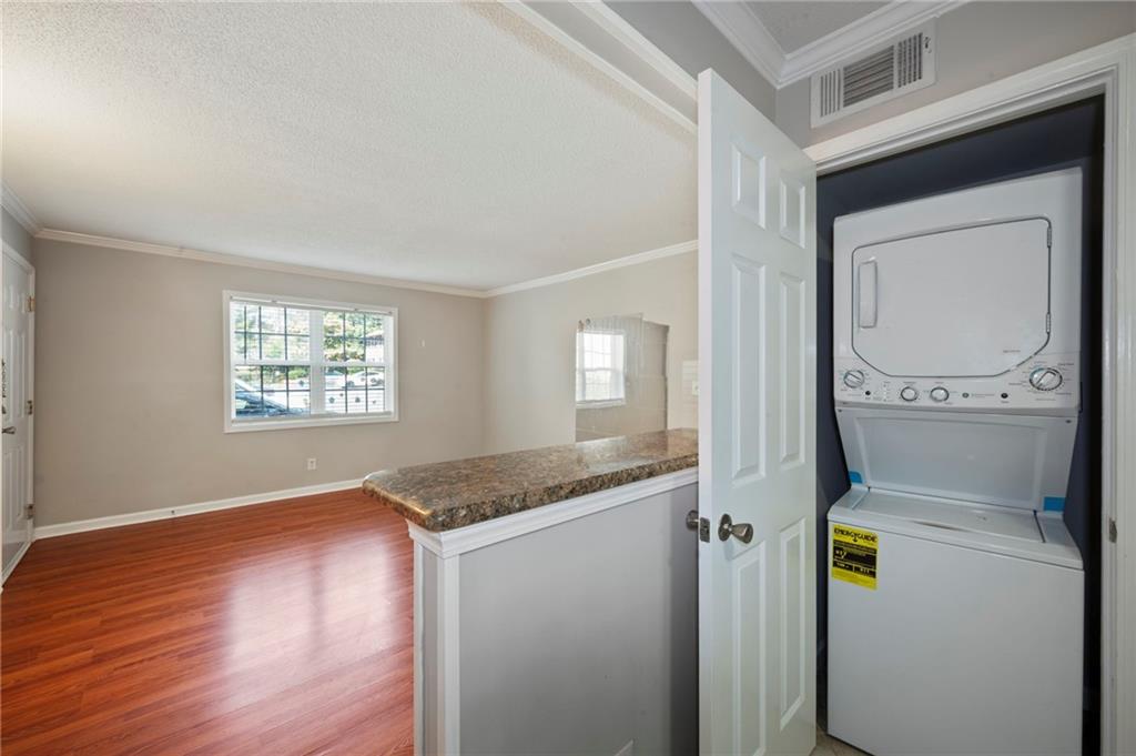 3665 Chestnut Drive, Unit D3 Atlanta, GA 30340 - Photo 11 of 16 a view of hallway with washer and dryer