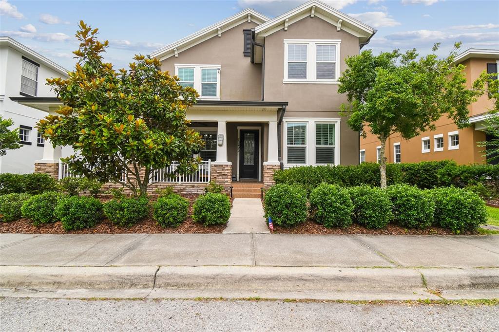 front view of a house and a yard
