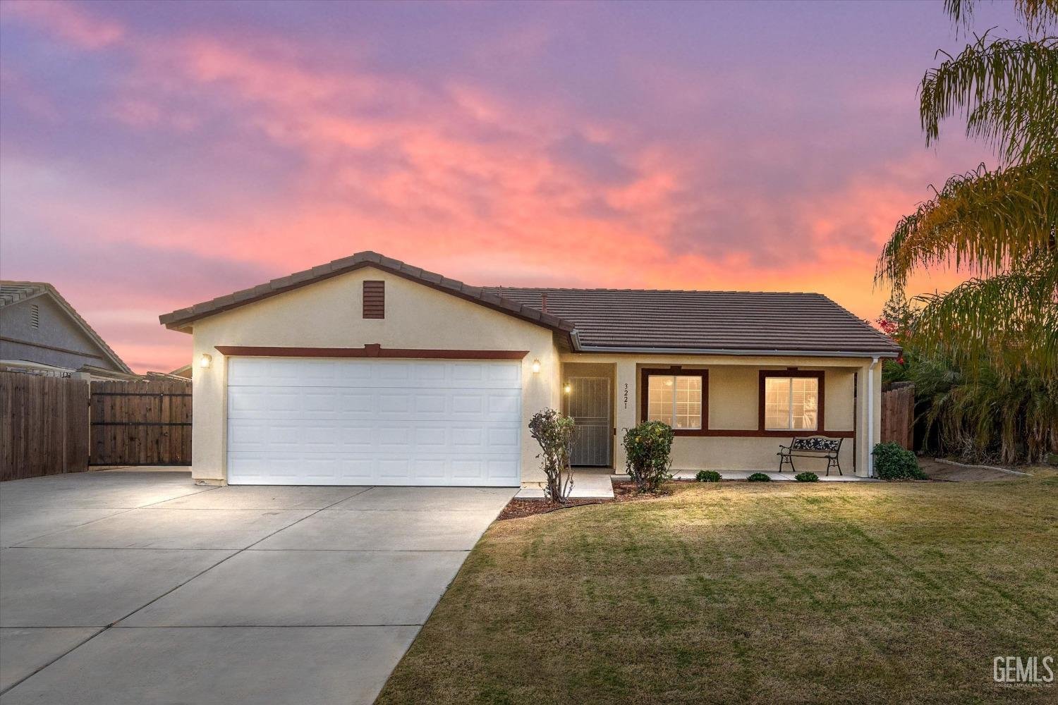 Undisclosed Address Bakersfield, CA 93308 - Photo 1 of 37 a front view of house with yard and trees around