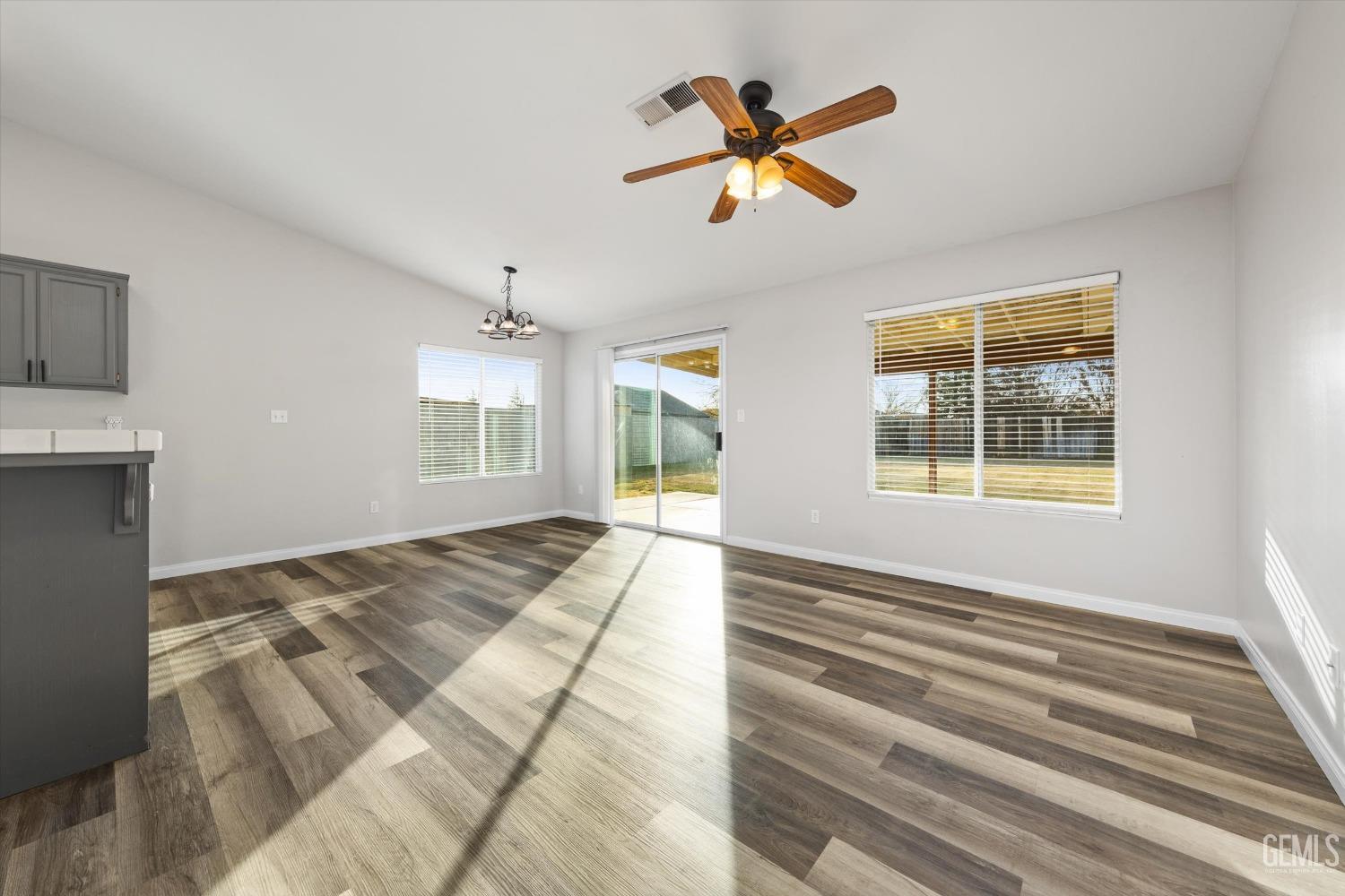 Undisclosed Address Bakersfield, CA 93308 - Photo 13 of 37 a view of an empty room with a window