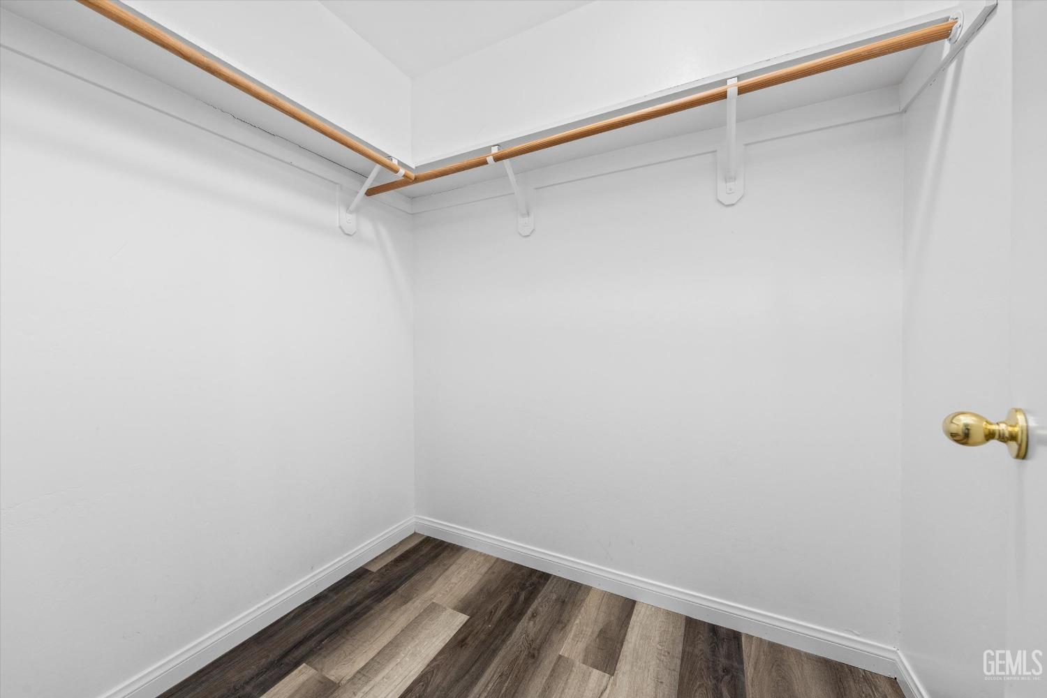 Undisclosed Address Bakersfield, CA 93308 - Photo 23 of 37 a view of a room with racks on the wall