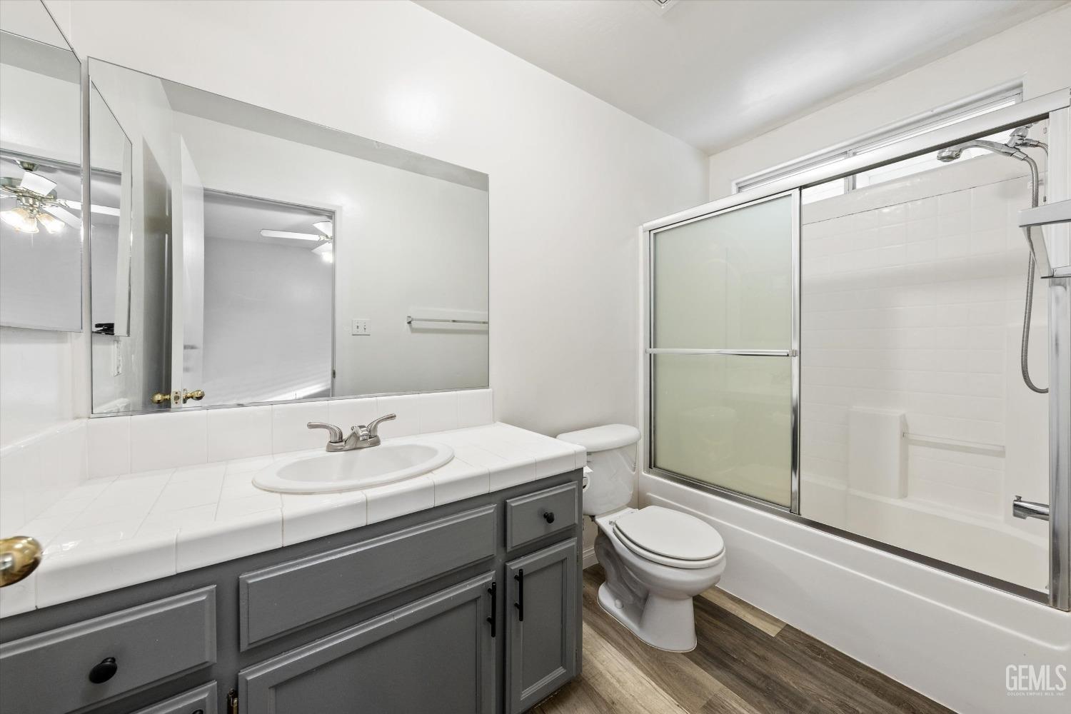 Undisclosed Address Bakersfield, CA 93308 - Photo 24 of 37 a bathroom with a sink toilet and shower