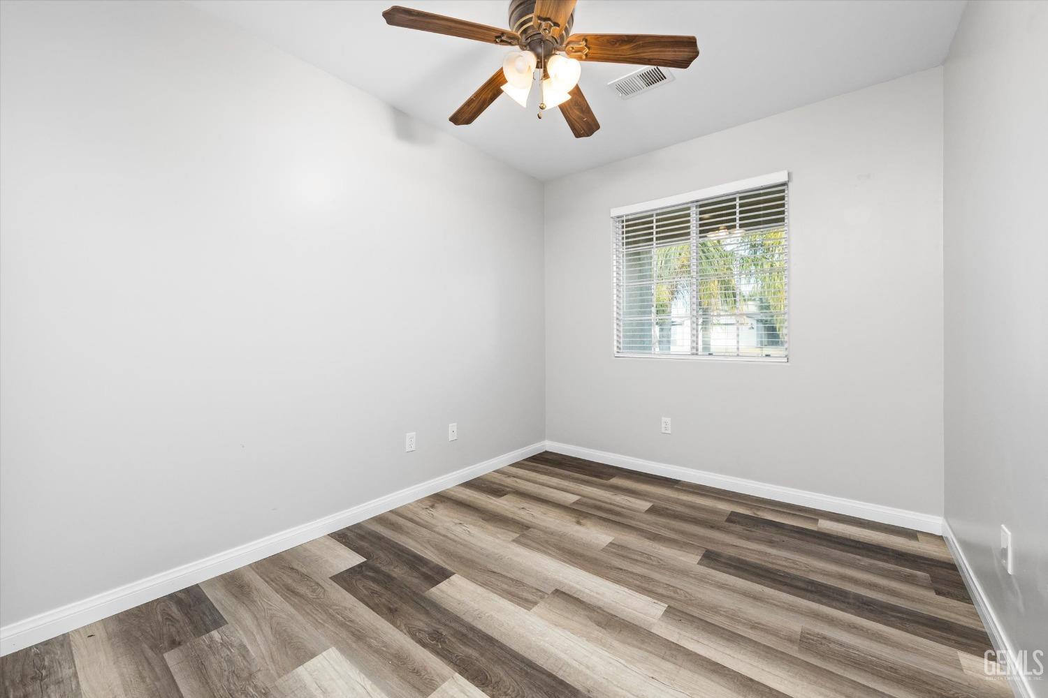 Undisclosed Address Bakersfield, CA 93308 - Photo 25 of 37 a view of room with a ceiling fan