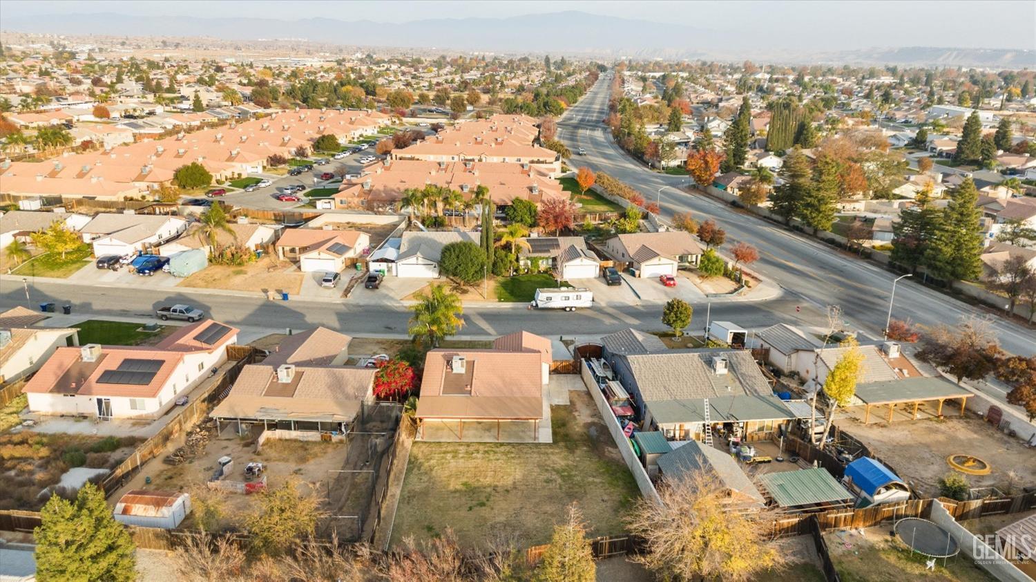 Undisclosed Address Bakersfield, CA 93308 - Photo 6 of 37 an aerial view of residential houses with outdoor space