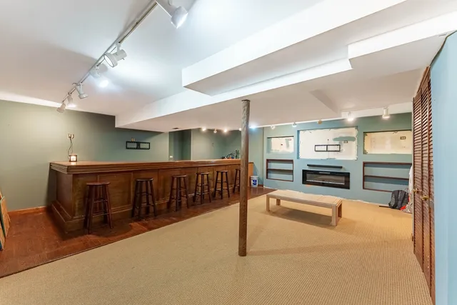 a view of an entryway with a living room