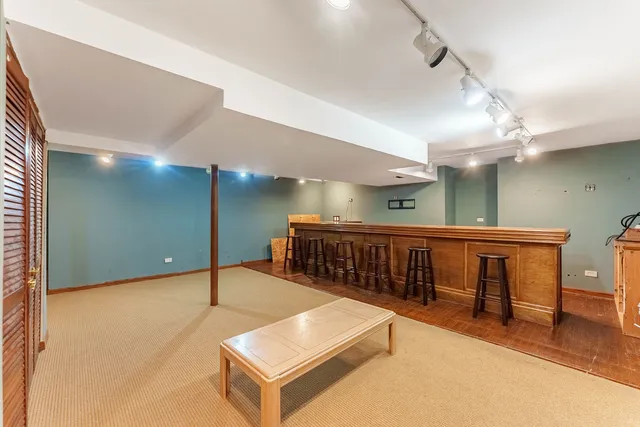 a view of an entryway with a room and windows