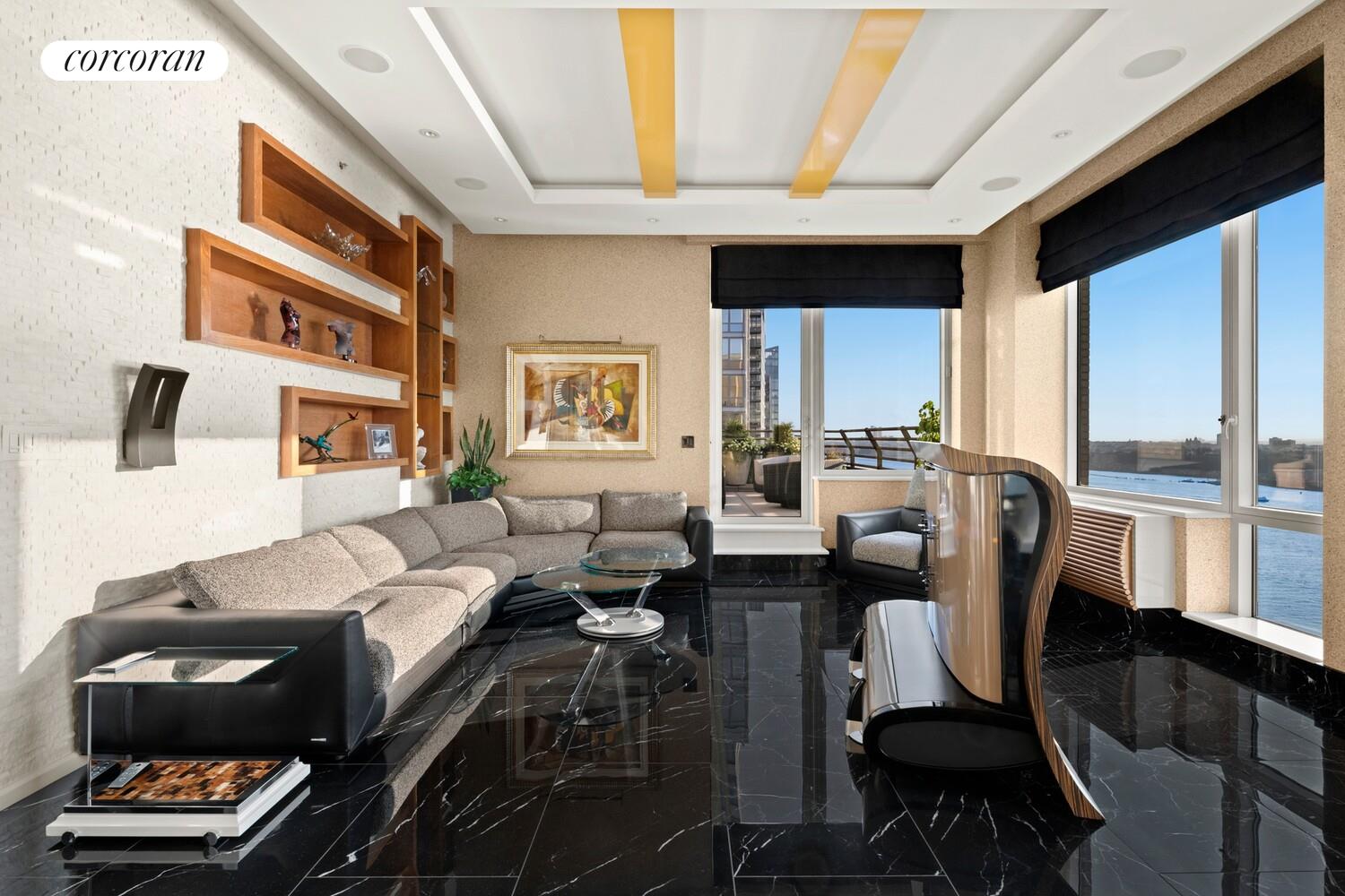 a living room with furniture and a window