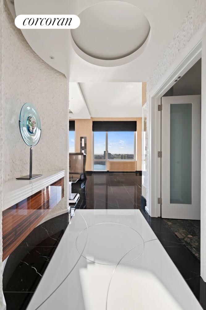 100 Riverside Boulevard, Unit PHB Manhattan, NY 10069 - Photo 11 of 34 a living room with furniture and a rug