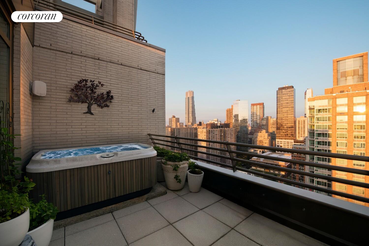 100 Riverside Boulevard, Unit PHB Manhattan, NY 10069 - Photo 16 of 34 a terrace with a bench and white cabinet