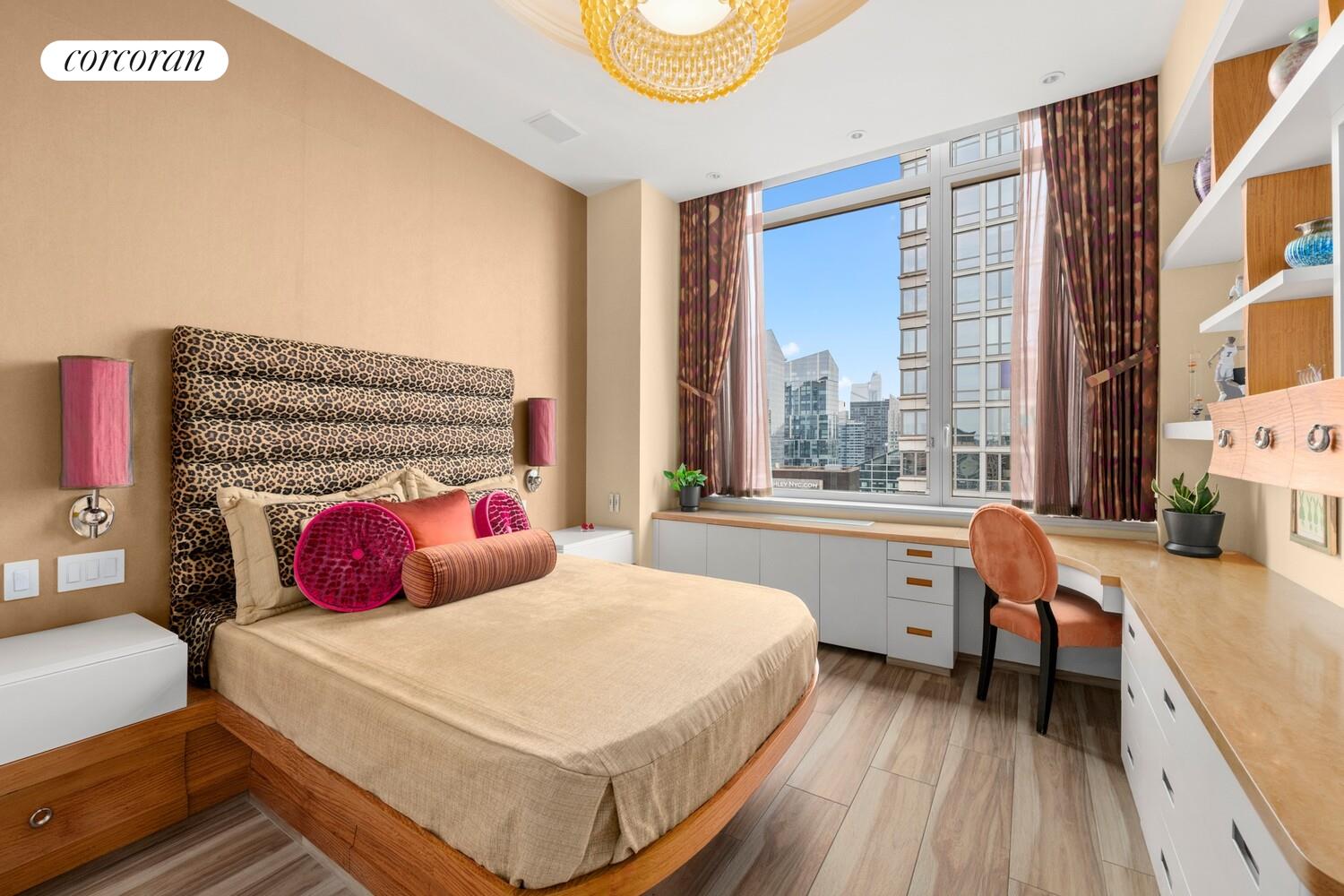 100 Riverside Boulevard, Unit PHB Manhattan, NY 10069 - Photo 23 of 34 a bedroom with a bed and wooden floor