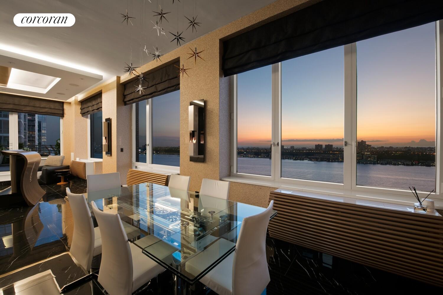 100 Riverside Boulevard, Unit PHB Manhattan, NY 10069 - Photo 30 of 34 a view of a dining room with furniture window and outside view