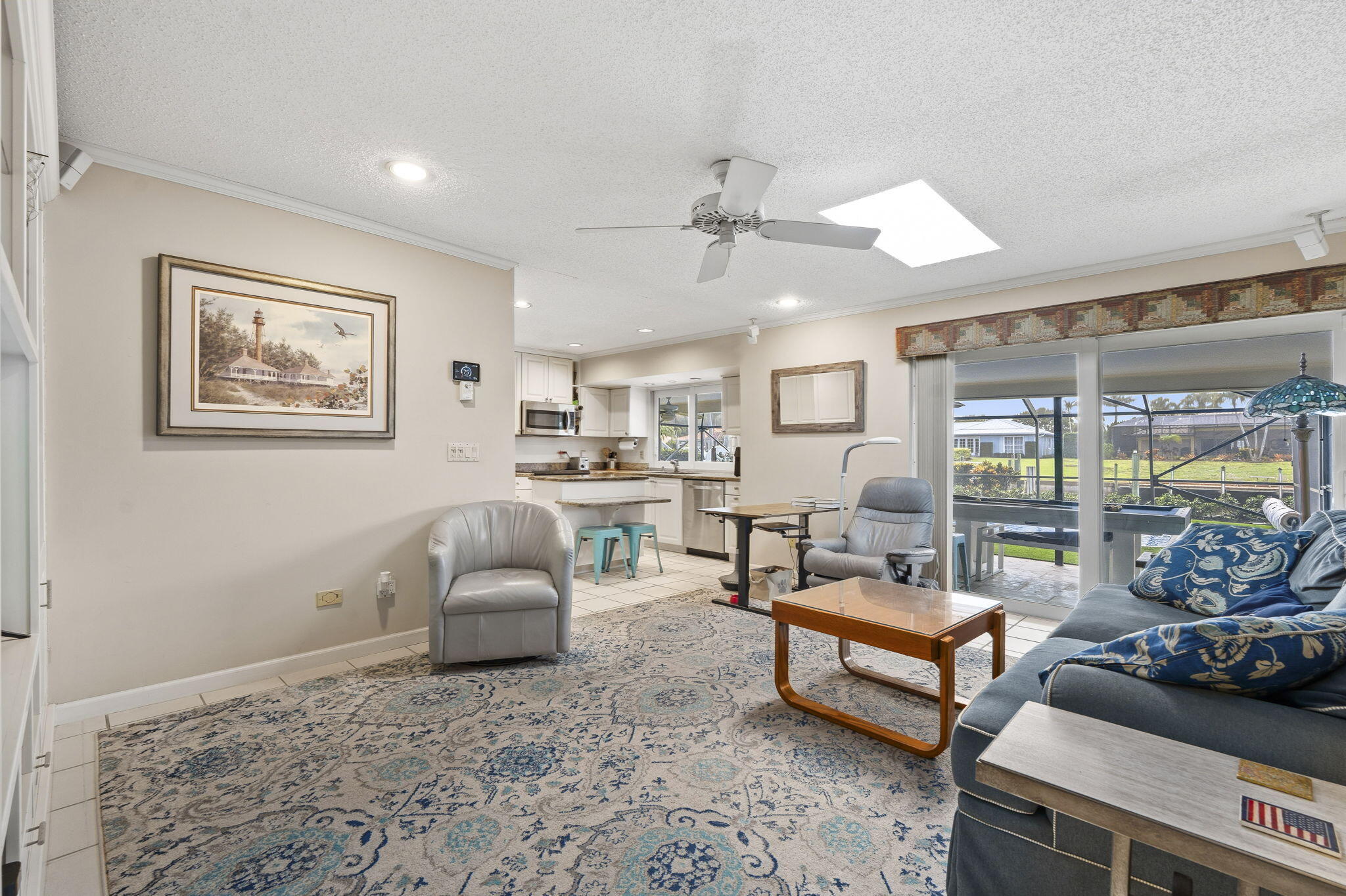 3374 Southeast Fairway East Stuart, FL 34997 - Photo 18 of 65 a living room with furniture and a large window