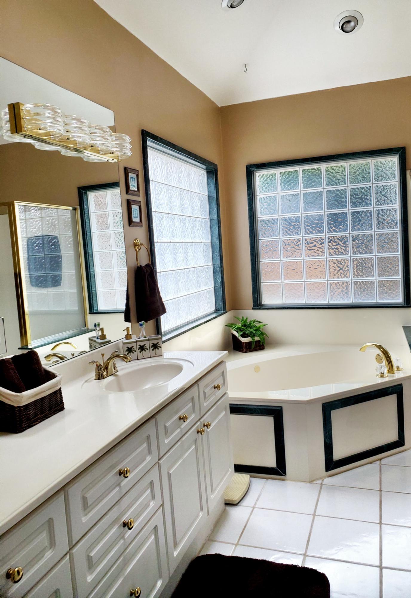 3911 Mesa Road Destin, FL 32541 - Photo 18 of 36 a bathroom with a sink and a bathtub