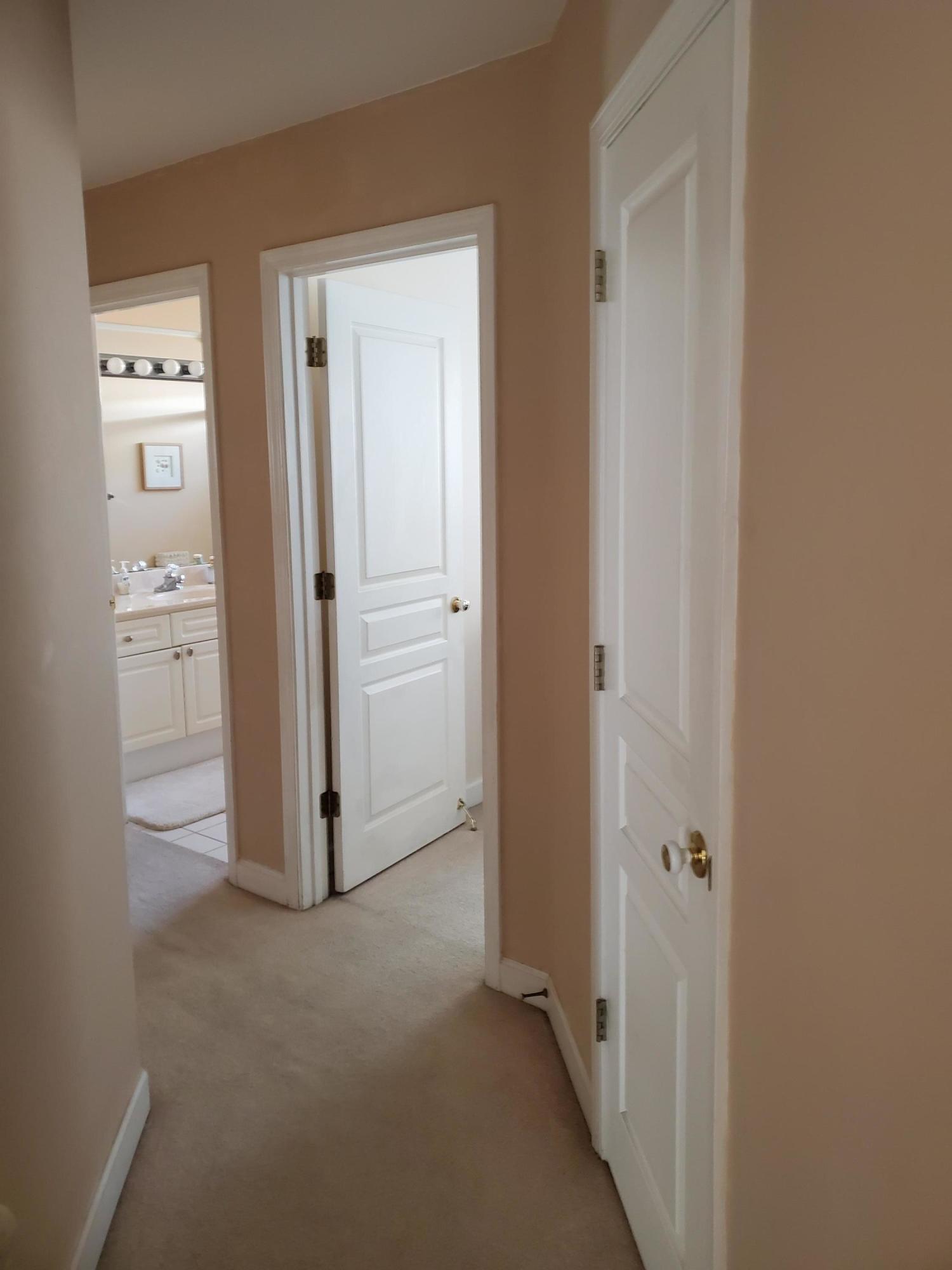 3911 Mesa Road Destin, FL 32541 - Photo 22 of 36 an empty room with closet and a bathroom
