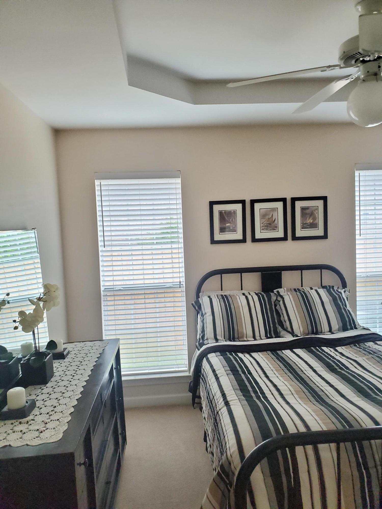 3911 Mesa Road Destin, FL 32541 - Photo 23 of 36 a bedroom with bed and a window