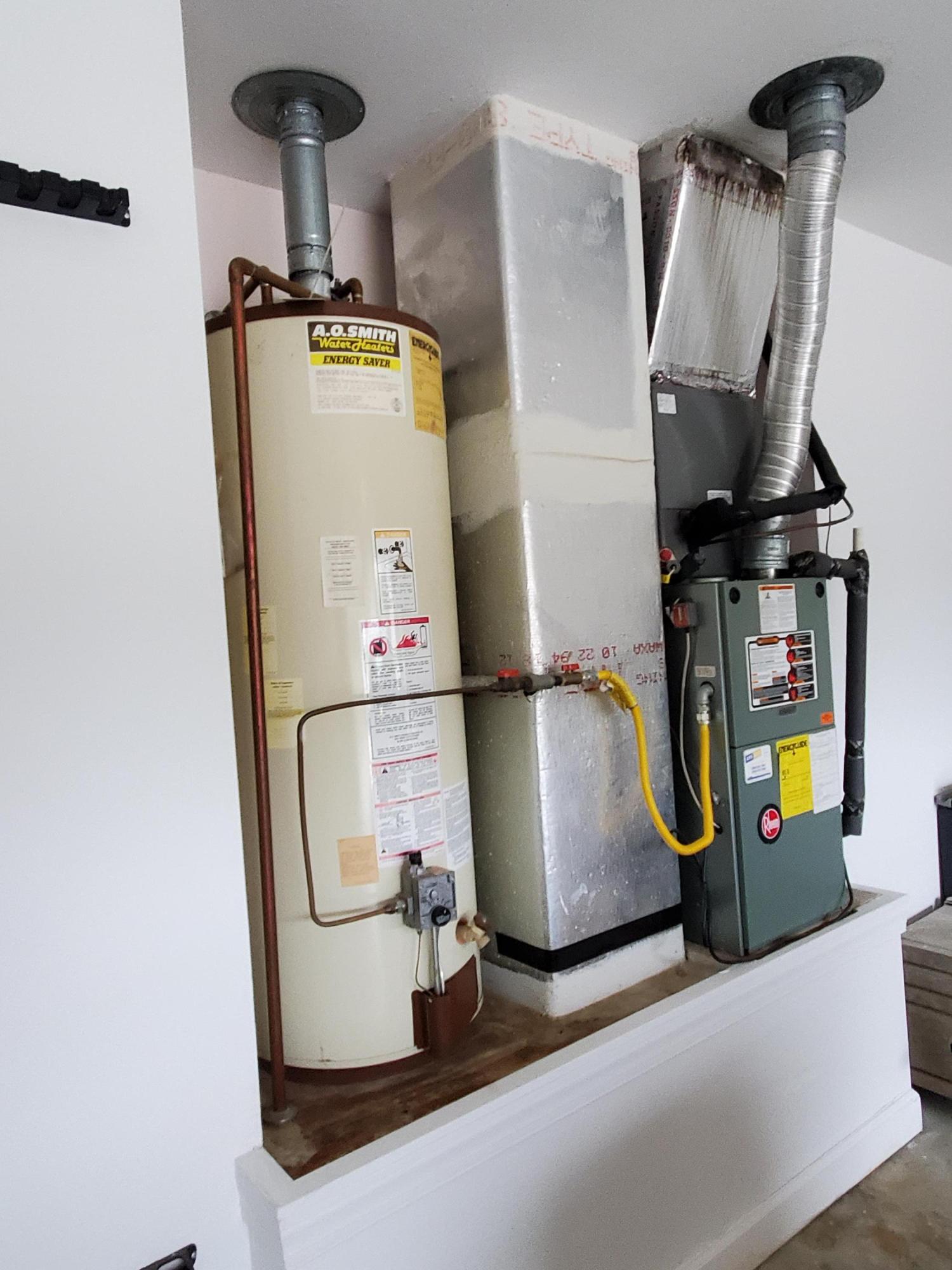 3911 Mesa Road Destin, FL 32541 - Photo 35 of 36 a room with water heater and stainless steel appliances