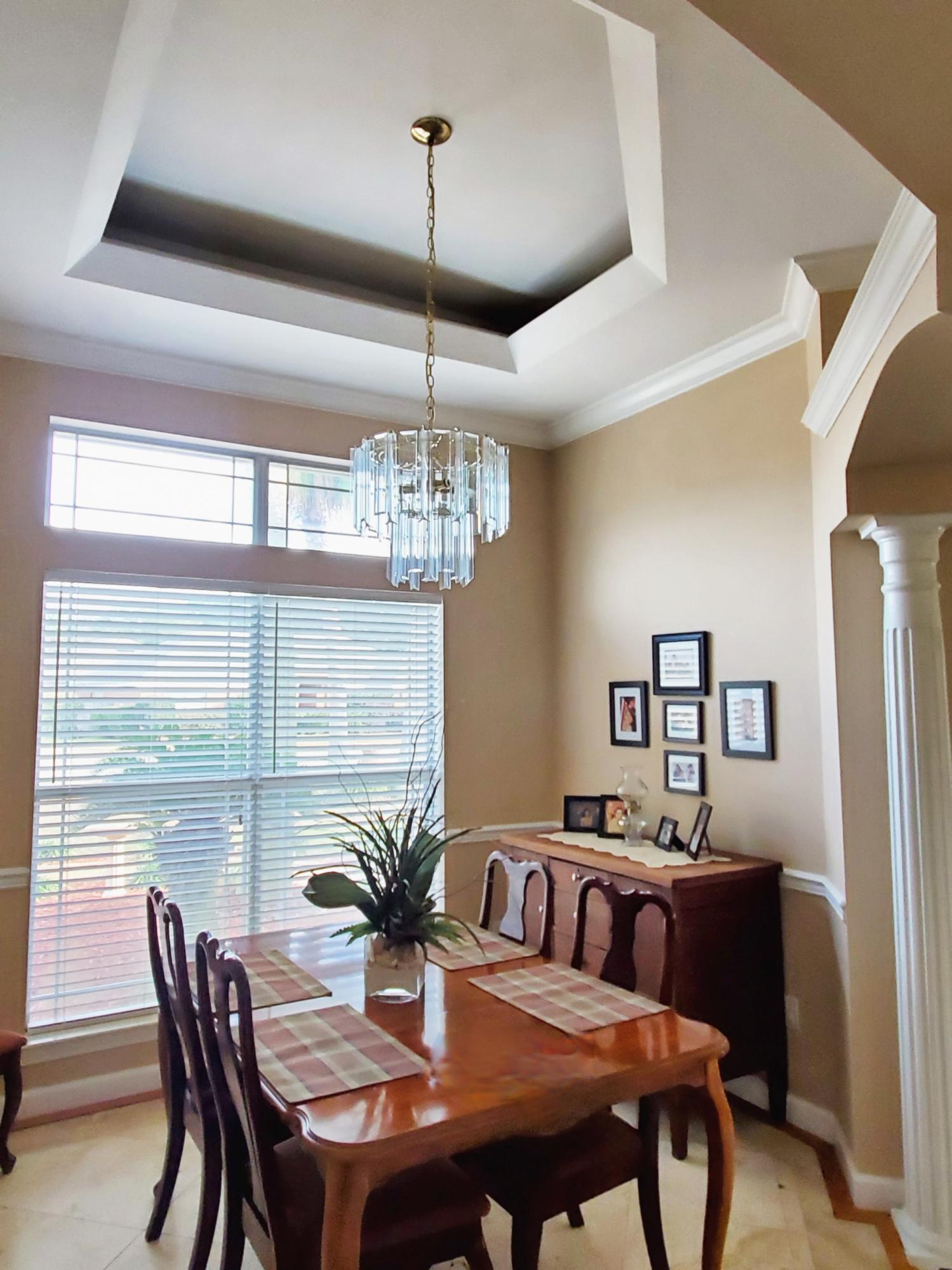 3911 Mesa Road Destin, FL 32541 - Photo 7 of 36 a view of a dining room with furniture window and outside view