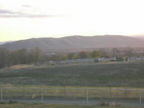 9440 Bittner Road Yakima, WA 98901 - Photo 5 of 8 a view of a house with a mountain