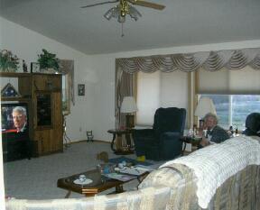 9440 Bittner Road Yakima, WA 98901 - Photo 7 of 8 a bed room with a bed and a television