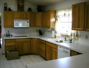 9440 Bittner Road Yakima, WA 98901 - Photo 8 of 8 a kitchen with sink cabinets and window
