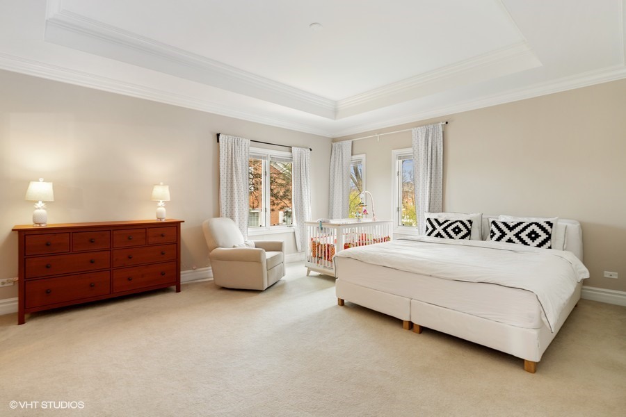 1032 Mar Ln Drive Lake Forest, IL 60045 - Photo 8 of 22 a spacious bedroom with a bed and window