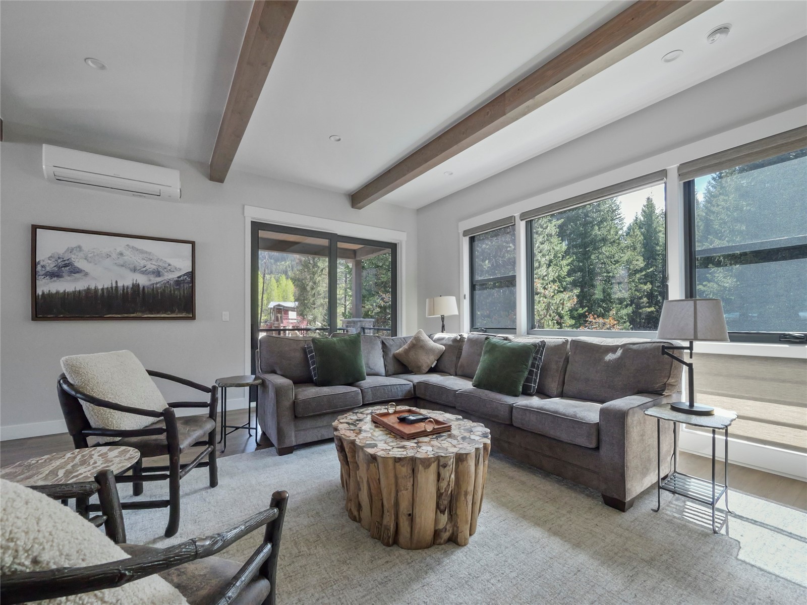 75 Alcove Court, Unit 75 Keystone, CO 80435 - Photo 12 of 40 a living room with furniture and a large window