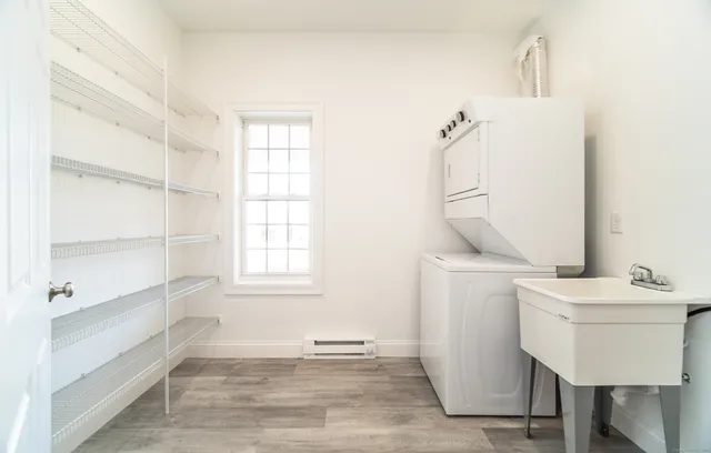 a view of a room with washer and dryer