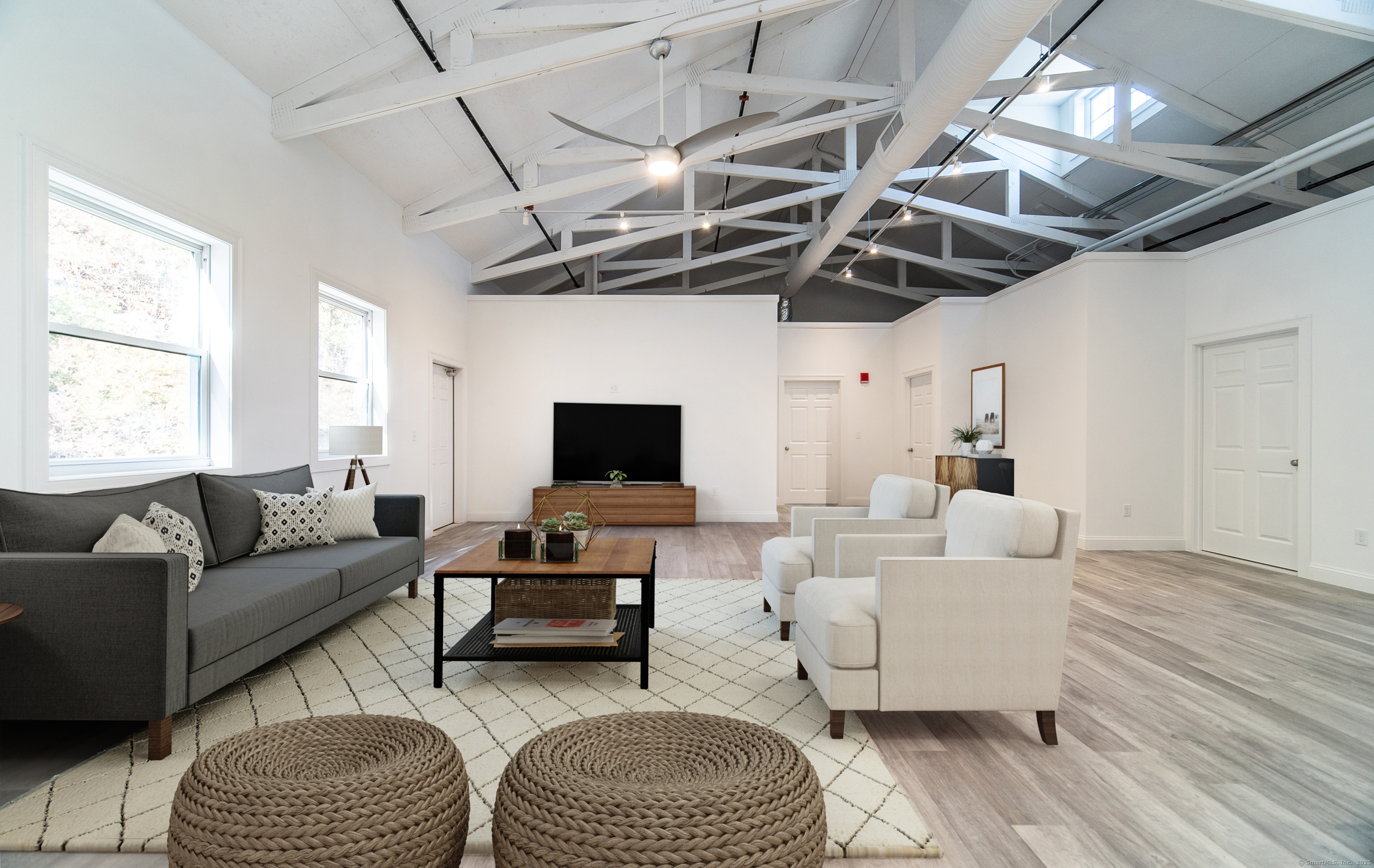 1154 Poquonnock Road, Unit 3 Groton, CT 06340 - Photo 3 of 17 a living room with furniture and a flat screen tv