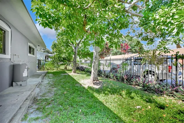 a view of a backyard with a garden