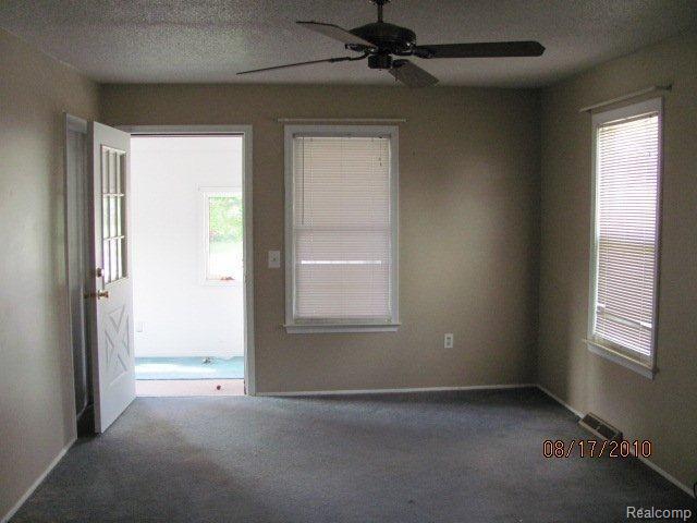 2483 East Dodge Road Clio, MI 48420 - Photo 2 of 9 7 Living room