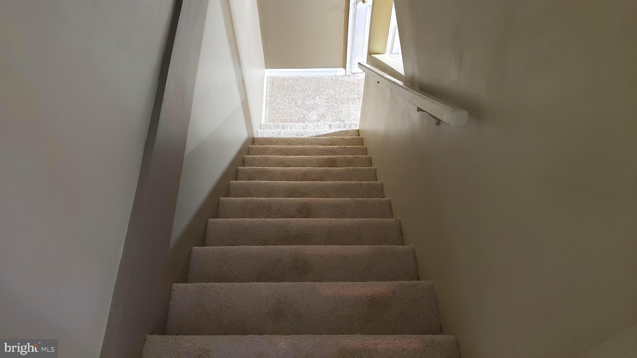 600 Braeside Road Baltimore, MD 21229 - Photo 20 of 32 NEW CARPETING ON STAIRS TO LOWER LEVEL