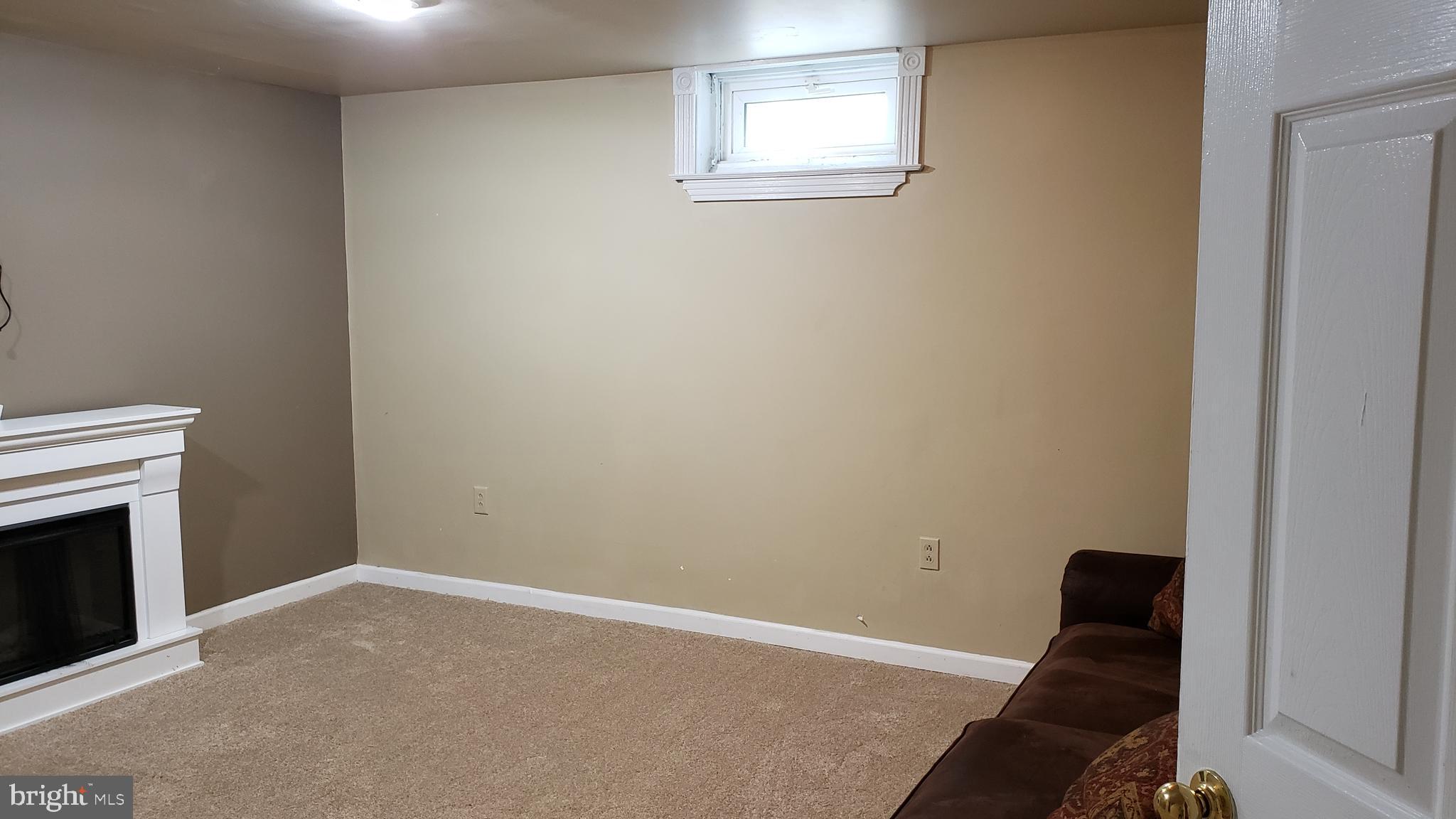 600 Braeside Road Baltimore, MD 21229 - Photo 21 of 32 REC ROOM IN LOWER LEVEL W/NEW CARPET