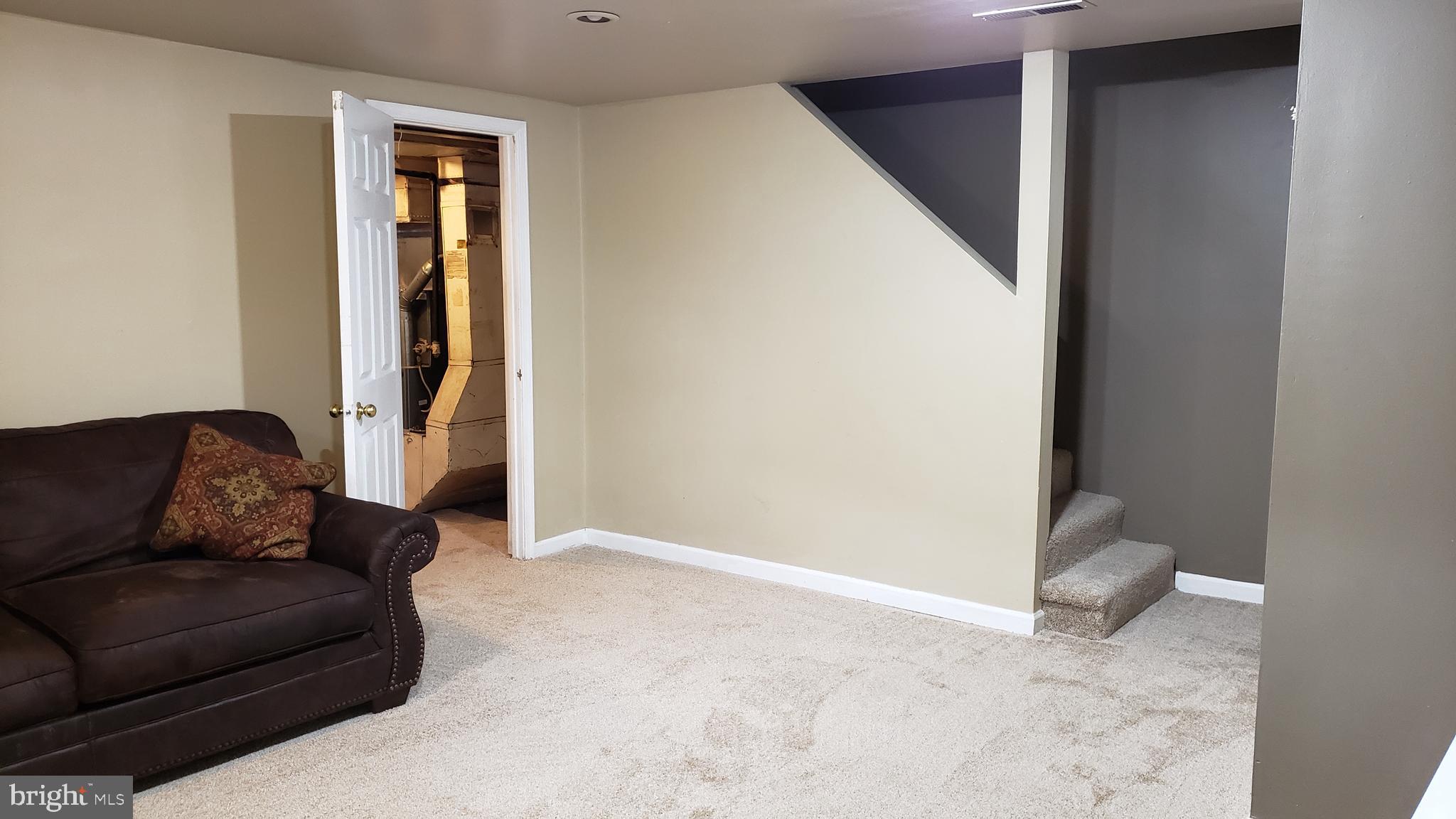 600 Braeside Road Baltimore, MD 21229 - Photo 22 of 32 REC ROOM IN LOWER LEVEL W/NEW CARET